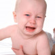 Symptomen van eerste tandjes bij baby
