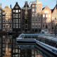 Boten op het Damrak